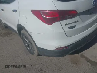 2016 Hyundai Santa Fe z VIN 5XYZTDLB7GG329320, wystawiony jako IAAI lot #42145591 z przebiegiem 106 345 mil mil oraz . Historia ofert i sprzedaży dostępna na DreamBid. Obrazek 6.