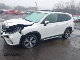 2019 Subaru Forester Touring with VIN JF2SKAWC3KH555900, listed as a IAAI auction lot 41558281 with 138,351 mi miles. Bid and sale history available at carsss.com. Image 19.