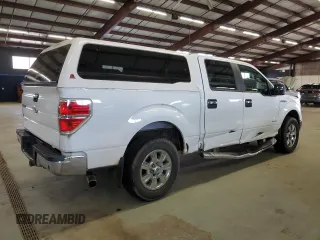 2011 Ford F-150 XLT with VIN 1FTFW1ET5BFC01720, listed as a Copart auction lot 52070125 with 192,160 mi miles and Salvage Title. Bid and sale history available at carsss.com. Image 3.