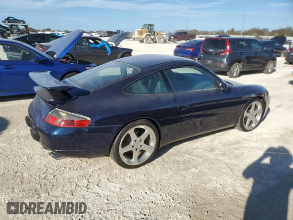 2000 Porsche 911 z VIN WP0AA2996YS621130, wystawiony jako Copart lot #77096434 z przebiegiem Nie podano mil oraz Szkoda całkowita • Salvage title. Historia ofert i sprzedaży dostępna na DreamBid. Obrazek 3.