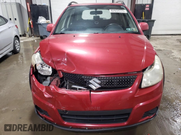 2012 Suzuki SX4 Crossover with VIN JS2YB5A38C6301805, listed as a Copart auction lot 82834774 with 141,858 mi miles and Salvage Title. Bid and sale history available at carsss.com. Image 5.