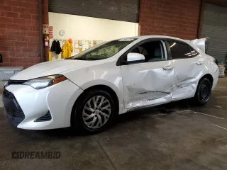 2019 Toyota Corolla L z VIN 5YFBURHEXKP940266, wystawiony jako Copart lot #47655575 z przebiegiem 119 022 mil mil oraz Szkoda całkowita • Salvage title. Historia ofert i sprzedaży dostępna na DreamBid. Obrazek 1.