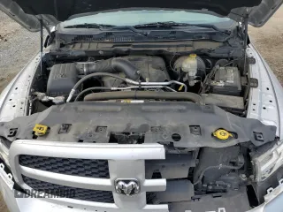 2016 Ram 1500 Tradesman z VIN 1C6RR7FT7GS411554, wystawiony jako Copart lot #48020435 z przebiegiem 128 679 mil mil oraz Szkoda całkowita • Salvage title. Historia ofert i sprzedaży dostępna na DreamBid. Obrazek 11.