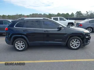 2014 Jeep Cherokee Latitude with VIN 1C4PJLCB0EW288309, listed as a IAAI auction lot 41624746 with 164,037 mi miles and . Bid and sale history available at DreamBid. Image 13.