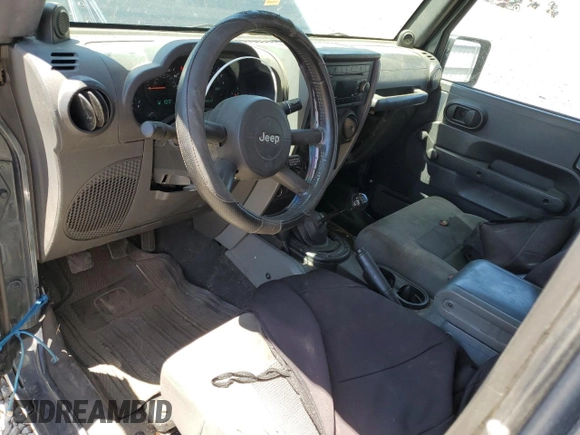 2008 Jeep Wrangler Unlimited X with VIN 1J4GA39168L509720, listed as a Copart auction lot 61014895 with 238,932 mi miles and Salvage title. Bid and sale history available at DreamBid. Image 8.