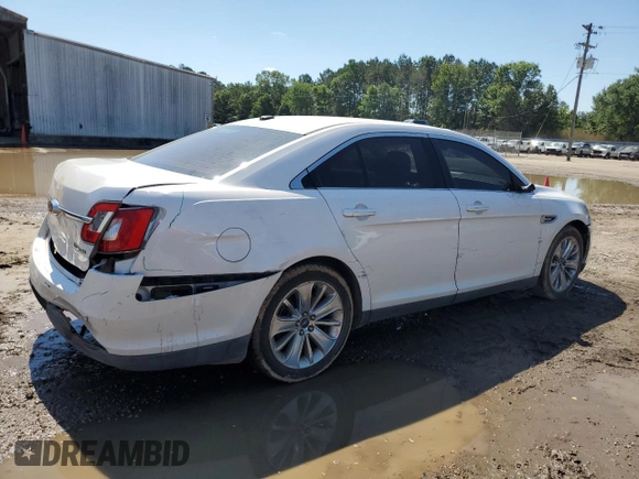 2011 Ford Taurus Limited with VIN 1FAHP2FW8BG141839, listed as a Copart auction lot 56594285 with 121,236 mi miles and Salvage title. Bid and sale history available at DreamBid. Image 3.