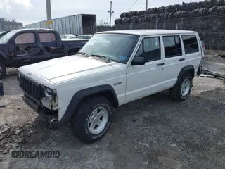 1996 Jeep Cherokee Sport with VIN 1J4FJ68S6TL234012, listed as a IAAI auction lot 41571658 with 255,817 mi miles. Bid and sale history available at carsss.com. Image 18.