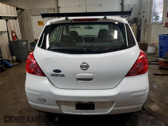 2009 Nissan Versa S with VIN 3N1BC13E99L483911, listed as a Copart auction lot 51591235 with Not Provided miles and Salvage Title. Bid and sale history available at DreamBid. Image 6.
