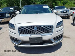 2019 Lincoln Nautilus Reserve z VIN 2LMPJ6L96KBL12639, wystawiony jako IAAI lot #42081118 z przebiegiem 23 741 mil mil oraz . Historia ofert i sprzedaży dostępna na DreamBid. Obrazek 6.