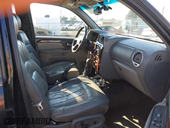 2002 GMC Envoy SLT z VIN 1GKDT13S522146661, wystawiony jako IAAI lot #40502587 z przebiegiem 274 877 mil mil oraz . Historia ofert i sprzedaży dostępna na DreamBid. Obrazek 5.