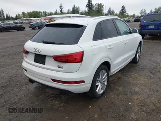 2017 Audi Q3 Premium with VIN WA1ECCFS5HR003565, listed as a IAAI auction lot 42140711 with 74,034 mi miles and . Bid and sale history available at DreamBid. Image 4.