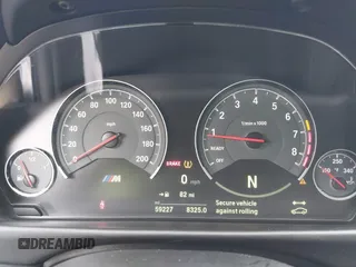 2019 BMW M4 with VIN WBS4Y9C53KAH82910, listed as a IAAI auction lot 41570315 with 59,227 mi miles. Bid and sale history available at carsss.com. Image 7.
