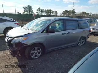 2015 Toyota Sienna L with VIN 5TDZK3DCXFS596277, listed as a IAAI auction lot 41229427 with 108,900 mi miles and . Bid and sale history available at DreamBid. Image 14.