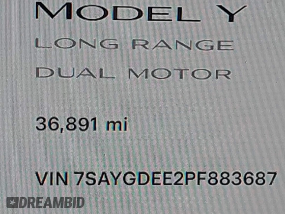 2023 Tesla Model Y Long Range with VIN 7SAYGDEE2PF883687, listed as a IAAI auction lot 41589837 with 36,890 mi miles. Bid and sale history available at carsss.com. Image 16.