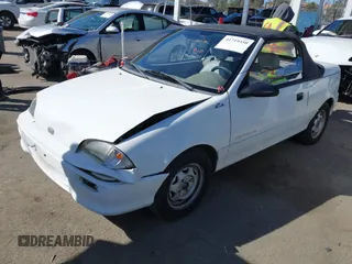 1992 Geo Metro z VIN JG1MR3364NK213871, wystawiony jako IAAI lot #41719350 z przebiegiem 22 589 mil mil oraz . Historia ofert i sprzedaży dostępna na DreamBid. Obrazek 20.
