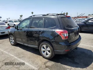 2014 Subaru Forester Premium with VIN JF2SJAEC0EH526895, listed as a Copart auction lot 58445005 with 131,186 mi miles and Salvage title. Bid and sale history available at DreamBid. Image 2.