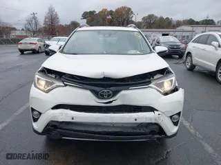 2017 Toyota RAV4 XLE with VIN JTMRFREV6HJ716907, listed as a IAAI auction lot 41056444 with 118,335 mi miles. Bid and sale history available at carsss.com. Image 6.