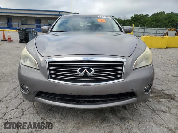 2013 Infiniti M with VIN JN1BY1AR2DM601965, listed as a Copart auction lot 62014215 with 134,047 mi miles and Salvage title. Bid and sale history available at DreamBid. Image 5.