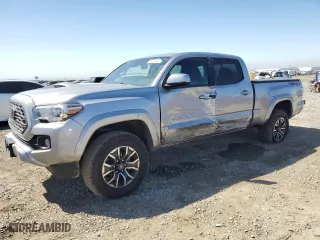 2021 Toyota Tacoma 4WD SR5 with VIN 3TMDZ5BN9MM099787, listed as a Copart auction lot 49717425 with 56,374 mi miles and Salvage Title. Bid and sale history available at carsss.com. Image 1.