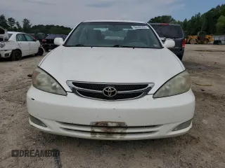 2004 Toyota Camry LE z VIN JTDBE32K440281087, wystawiony jako Copart lot #60486995 z przebiegiem 229 856 mil mil oraz Czysty tytuł • Clean title. Historia ofert i sprzedaży dostępna na DreamBid. Obrazek 5.