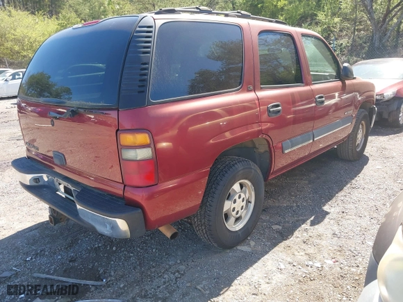 2002 Chevrolet Tahoe LT with VIN 1GNEC13Z22R284959, listed as a IAAI auction lot 41803861 with 278,795 mi miles. Bid and sale history available at carsss.com. Image 4.