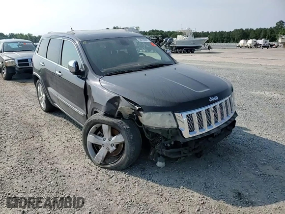 2011 Jeep Grand Cherokee Overland Summit with VIN 1J4RR6GT3BC686143, listed as a Copart auction lot 59218685 with 155,059 mi miles and Salvage title. Bid and sale history available at DreamBid. Image 14.