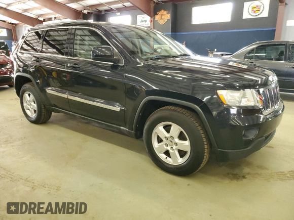 2011 Jeep Grand Cherokee Laredo with VIN 1J4RR4GG9BC521723, listed as a Copart auction lot 64126795 with 198,145 mi miles and Clean title. Bid and sale history available at DreamBid. Image 4.