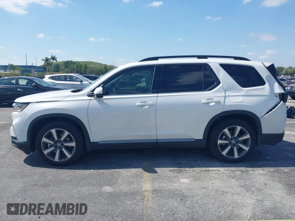 2024 Honda Pilot Touring z VIN 5FNYG2H72RB016937, wystawiony jako IAAI lot #42137854 z przebiegiem 18 028 mil mil oraz . Historia ofert i sprzedaży dostępna na DreamBid. Obrazek 14.
