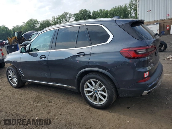 2019 BMW X5 xDrive40i with VIN 5UXCR6C57KLL11051, listed as a Copart auction lot 60268695 with 169,671 mi miles and Salvage title. Bid and sale history available at DreamBid. Image 2.