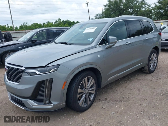2025 Cadillac XT6 FWD Premium Luxury with VIN 1GYKPCRS0SZ119055, listed as a IAAI auction lot 42574001 with 17,137 mi miles and . Bid and sale history available at DreamBid. Image 19.