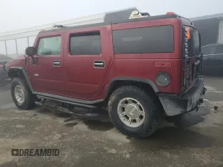 2003 Hummer H2 with VIN 5GRGN23UX3H147490, listed as a Copart auction lot 82876424 with 241,737 mi miles and Clean Title. Bid and sale history available at carsss.com. Image 2.