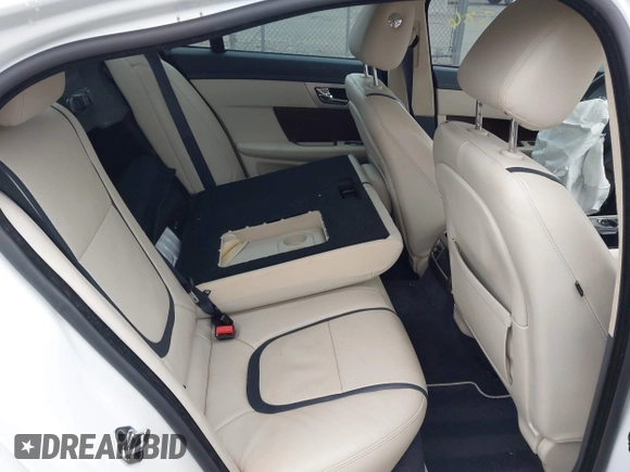 2014 Jaguar XF SC with VIN SAJWA0EX0E8U09381, listed as a IAAI auction lot 41783386 with 27,730 mi miles and . Bid and sale history available at DreamBid. Image 8.