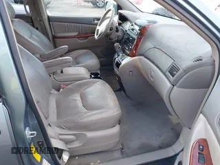 2004 Toyota Sienna XLE with VIN 5TDBA22C04S002407, listed as a IAAI auction lot 41385381 with 220,914 mi miles and . Bid and sale history available at DreamBid. Image 5.