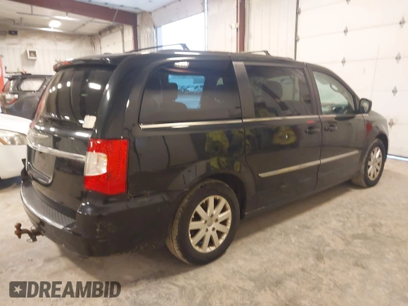 2015 Chrysler Town & Country Touring with VIN 2C4RC1BG6FR577855, listed as a IAAI auction lot 42187369 with 190,883 mi miles and . Bid and sale history available at carsss.com. Image 4.