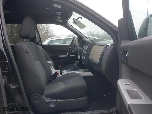 2008 Mercury Mariner with VIN 4M2CU81Z08KJ24857, listed as a IAAI auction lot 41645349 with 214,314 mi miles. Bid and sale history available at carsss.com. Image 5.