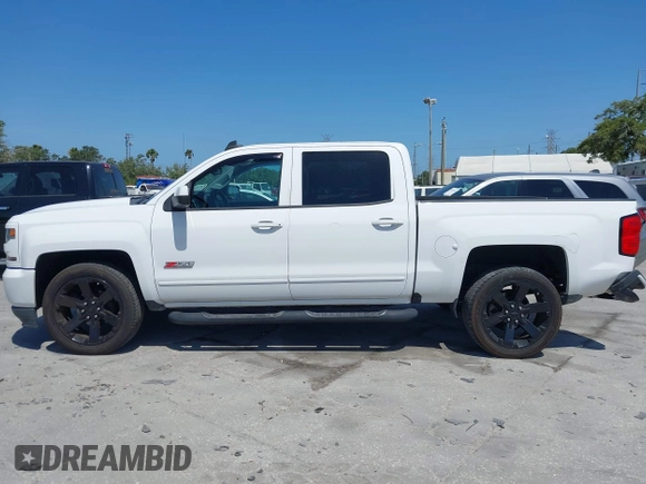 2017 Chevrolet Silverado 1500 LT with VIN 3GCUKREC4HG391101, listed as a IAAI auction lot 42129151 with 84,670 mi miles and . Bid and sale history available at DreamBid. Image 14.