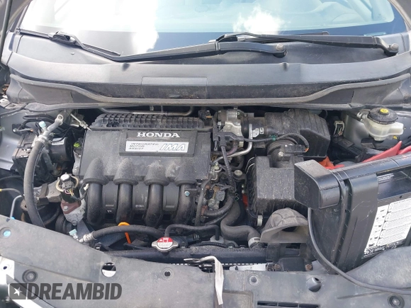 2010 Honda Insight EX with VIN JHMZE2H71AS017996, listed as a IAAI auction lot 42091356 with 142,474 mi miles and . Bid and sale history available at DreamBid. Image 10.