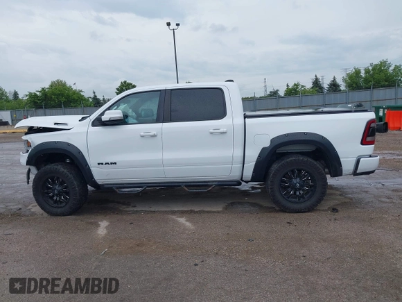 2020 Ram 1500 Big Horn with VIN 1C6SRFFT0LN105011, listed as a IAAI auction lot 42512812 with 71,825 mi miles and . Bid and sale history available at DreamBid. Image 14.
