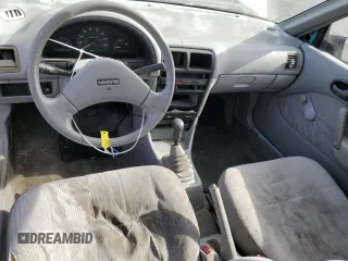1992 Geo Metro z VIN 2C1MS2465N6782913, wystawiony jako Copart lot #77405574 z przebiegiem 77 080 mil mil oraz Szkody całkowita. Historia ofert i sprzedaży dostępna na DreamBid. Obrazek 8.
