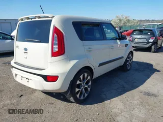 2012 Kia Soul + with VIN KNDJT2A68C7417016, listed as a IAAI auction lot 41984033 with 103,557 mi miles. Bid and sale history available at carsss.com. Image 4.