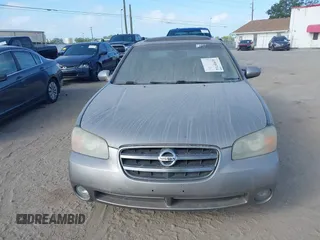 2003 Nissan Maxima GLE z VIN JN1DA31A83T411224, wystawiony jako IAAI lot #41905714 z przebiegiem Nie podano mil oraz . Historia ofert i sprzedaży dostępna na DreamBid. Obrazek 12.