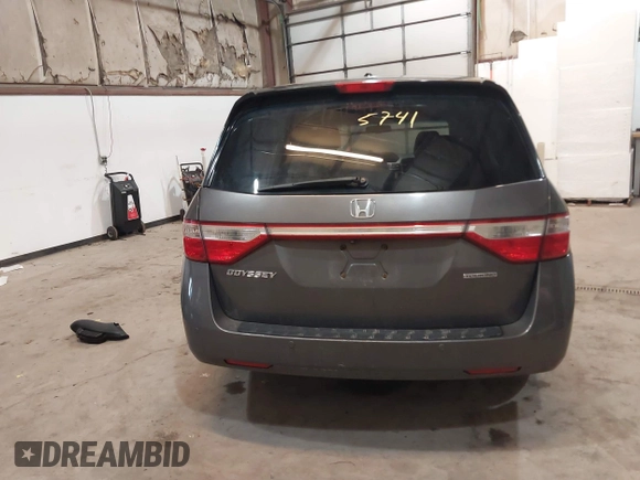 2011 Honda Odyssey Touring Elite with VIN 5FNRL5H96BB030946, listed as a IAAI auction lot 41465741 with 122,678 mi miles and . Bid and sale history available at DreamBid. Image 16.