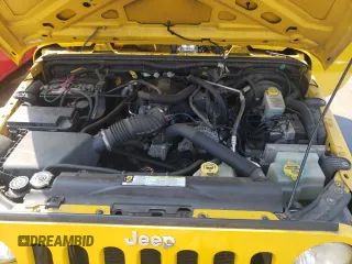 2007 Jeep Wrangler X z VIN 1J4GA39107L229841, wystawiony jako Copart lot #59998895 z przebiegiem 191 089 mil mil oraz Czysty tytuł • Clean title. Historia ofert i sprzedaży dostępna na DreamBid. Obrazek 11.