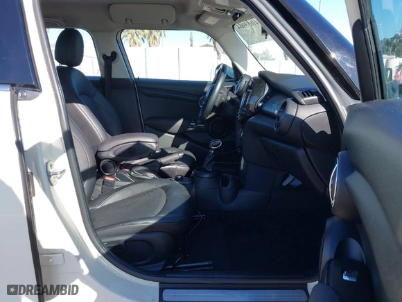 2018 MINI Hardtop 4 Door Cooper with VIN WMWXU1C58J2F80703, listed as a IAAI auction lot 41655964 with 65760 miles. Bid and sale history available at carsss.com. Image 5.