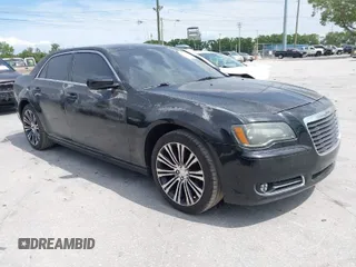 2014 Chrysler 300 with VIN 2C3CCABG7EH168021, listed as a IAAI auction lot 41767368 with 216,252 mi miles. Bid and sale history available at carsss.com. Image 1.