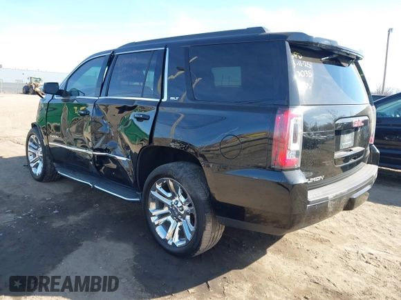 2016 GMC Yukon SLT with VIN 1GKS2BKC5GR253038, listed as a IAAI auction lot 41790030 with 101,039 mi miles. Bid and sale history available at carsss.com. Image 3.