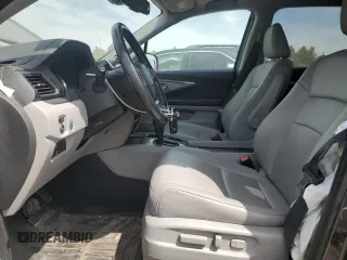 2017 Honda Pilot EX-L z VIN 5FNYF6H61HB061139, wystawiony jako Copart lot #55593095 z przebiegiem 107 170 mil mil oraz Szkoda całkowita • Salvage title. Historia ofert i sprzedaży dostępna na DreamBid. Obrazek 7.