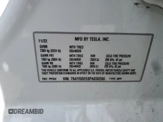 2023 Tesla Model Y Long Range z VIN 7SAYGDEE8PA030286, wystawiony jako Copart lot #50945465 z przebiegiem 43 676 mil mil oraz Szkoda całkowita • Salvage title. Historia ofert i sprzedaży dostępna na DreamBid. Obrazek 15.