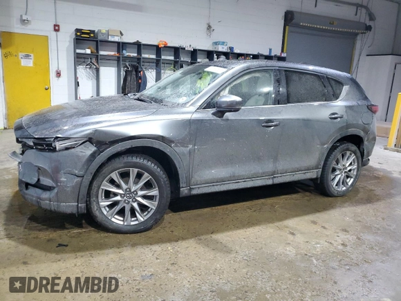 2021 Mazda CX-5 Grand Touring with VIN JM3KFADM5M0428282, listed as a Copart auction lot 42567825 with 33,763 mi miles and Salvage Title. Bid and sale history available at carsss.com. Image 1.