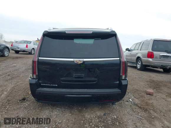 2019 Cadillac Escalade Luxury z VIN 1GYS4BKJ1KR398505, wystawiony jako IAAI lot #40662422 z przebiegiem 57 932 mil mil oraz . Historia ofert i sprzedaży dostępna na DreamBid. Obrazek 16.